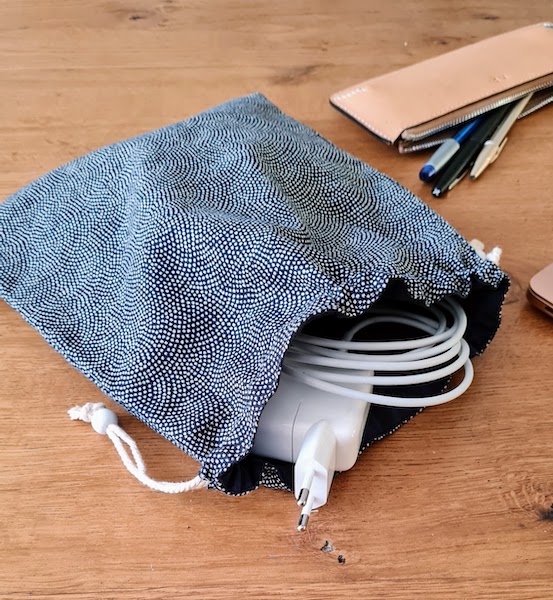 Dot cable storage pouch